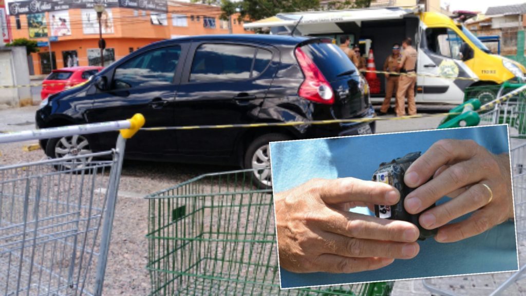 Homens são vistos instalando dispositivo em veículo estacionado em supermercado